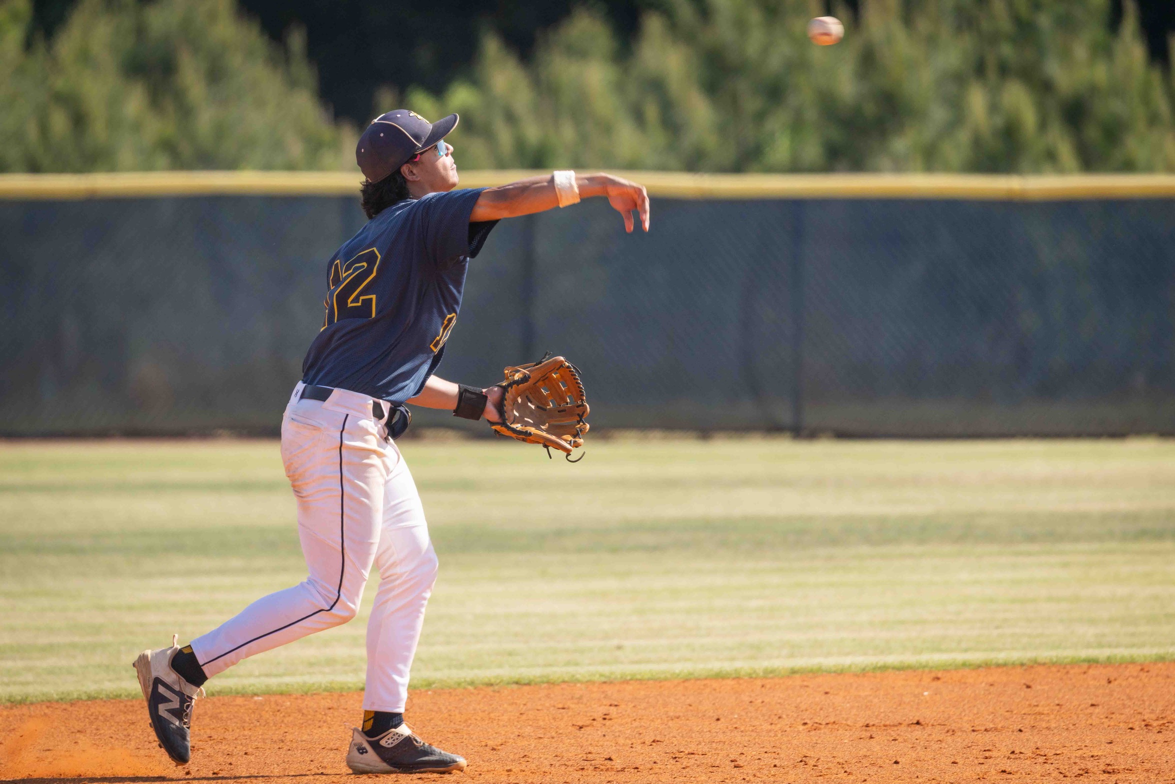 Diego Garcia throws the ball from the infield.