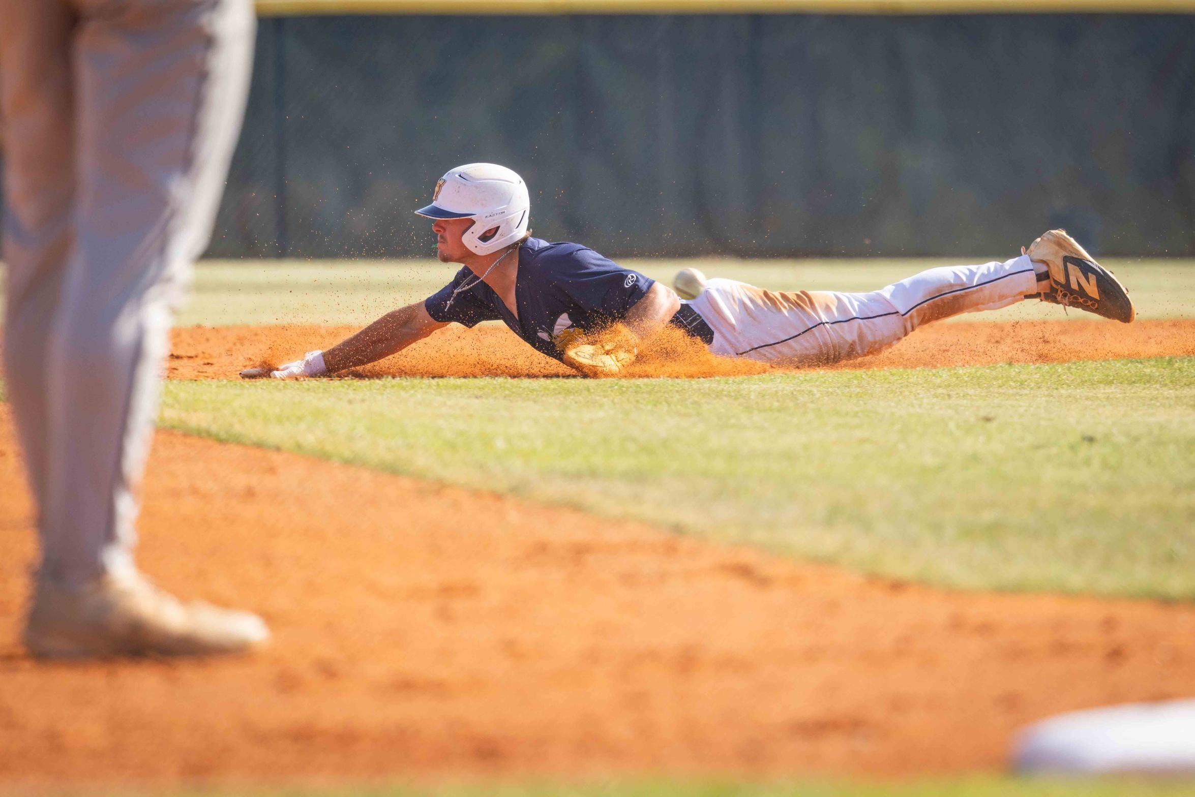 #3 Gabe Herold slides into second base